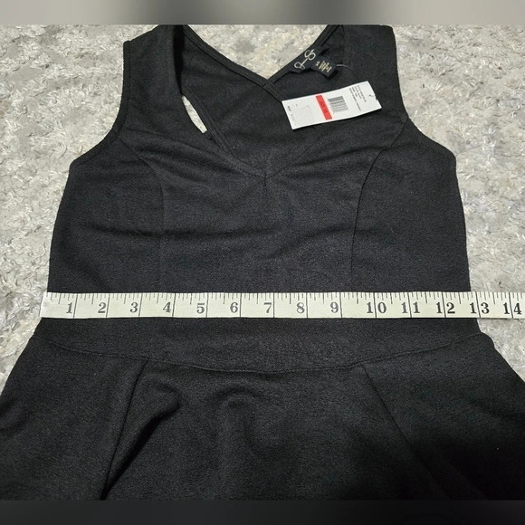 ✨️4/$20. JESSICA SIMPSON Black Sleeveless Peplum Top, XS - Picture 10 of 11